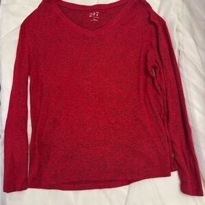 Maurices 24/7 red heathered v-neck long sleeve sweater with ribbed cuffs.